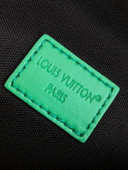LOUIS VUITTON LV 25S DISCOVERY BUMBAG 44 IN BLACK NEON JADE MONOGRAM ECLIPSE CANVAS AND CALFSKIN
