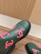 CHANEL RAIN BOOTS GREEN FOREST TPU WITH PINK LOGO