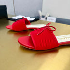 CHANEL BOW SLIPPERS IN CANDY RED LAMBSKIN