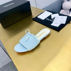 CHANEL BOW SLIPPERS IN LIGHT BLUE LAMBSKIN