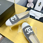 CHANEL SLIP-ON 25S IN BLACK AND WHITE FABRIC WITH STRIPED PATTERN