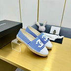CHANEL SLIP-ON 25S IN BLUE AND WHITE FABRIC WITH STRIPED PATTERN