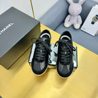 CHANEL SNEAKER IN BLACK CALFSKIN AND SUEDE