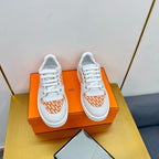 HERMES FREE SNEAKER IN WHITE CALFSKIN AND "H EN BIAIS" ORANGE CANVAS