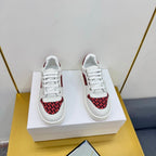 HERMES FREE SNEAKER IN WHITE CALFSKIN AND "H EN BIAIS" RED CANVAS.