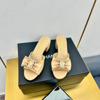 CHANEL BOWKNOT RHINESTONES MID HEEL MULE IN FLAX YELLOW CALFSKIN
