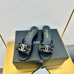 CHANEL BOWKNOT RHINESTONES MID HEEL MULE IN BLACK CALFSKIN