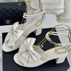 CHANEL Double C Big Bow Pearl Chain High Sandals White Lambskin