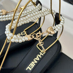 CHANEL Double C Big Bow Pearl Chain Sandals Light Pink Black Lambskin