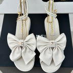 CHANEL Double C Big Bow Pearl Chain Sandals White Lambskin