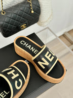 CHANEL THICK SOLE LETTER SLIPPERS IN BLACK SHEEPSKIN