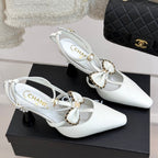 CHANEL CHAIN BOW HIGH HEEL 8 CM SLINGBACKS IN WHITE SUEDE