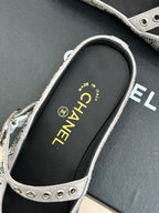 CHANEL FLAT MULES 25SS IN GREY EMBELLISHED WITH RHINESTONES