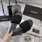 CHANEL SLIPPERS BLACK SHEEPSKIN