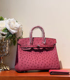 HERMES KELLY SELLIER 25 BAG IN CURRANT RED OSTRICH LEATHER WITH SILVER HARDWARE