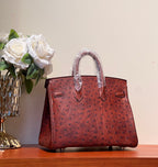 HERMES KELLY SELLIER 25 BAG IN BERRY RED OSTRICH LEATHER WITH GOLD HARDWARE