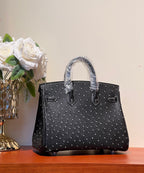 HERMES KELLY SELLIER 25 BAG IN BLACK OSTRICH LEATHER WITH WHITE RHINSTONES