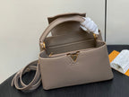 LOUIS VUITTON CAPUCINES MM 31 IN KHAKI BROWN TAURILLON
