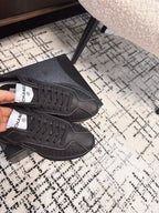 CHANEL CLASSIC SNEAKERS IN BLACK SHEEPSKIN