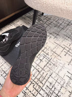 CHANEL CLASSIC SNEAKERS IN BLACK SHEEPSKIN