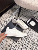 CHANEL CLASSIC SNEAKERS IN WHITE SHEEPSKIN