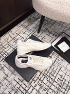 CHANEL CLASSIC SNEAKERS IN WHITE SHEEPSKIN