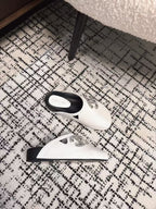 CHANEL FLAT MULES IN WHITE CALFSKIN