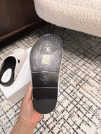 CHANEL FLAT MULES IN WHITE CALFSKIN