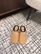 CHANEL FLAT MULE IN SEPIA BEIGE CALFSKIN
