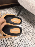 CHANEL FLAT MULE IN SEPIA BEIGE CALFSKIN