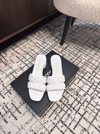 CHANEL MID HEEL MULES IN WHITE SHEEPSKIN