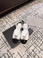 CHANEL FLAT SLINGBACKS IN WHITE MIX BLACK CALFSKIN