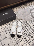 CHANEL FLAT SLINGBACKS IN WHITE MIX BLACK CALFSKIN