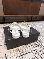 CHANEL FLAT SLINGBACKS IN WHITE MIX BLACK CALFSKIN