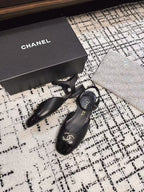 CHANEL FLAT SLINGBACKS IN BLACK CALFSKIN