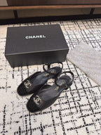CHANEL FLAT SLINGBACKS IN BLACK CALFSKIN