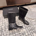 CHANEL BOOTS IN BLACK SUEDE AND CALFSKIN 393518