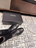 CHANEL BOOTS IN BLACK SUEDE AND CALFSKIN 393518