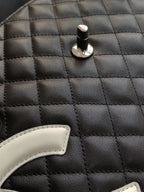 CHANEL CAMBON LARGE FLAP 25S 33 CM IN BLACK CALFSKIN WITH WHITE LOGO