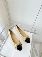 CHANEL BALLET FLAT IN FLAX YELLOW MIX BLACK CALFSKIN