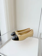 CHANEL BALLET FLAT IN FLAX YELLOW MIX BLACK CALFSKIN