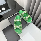 CHANEL dad sandals green white mules