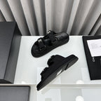 CHANEL dad sandals black textile mules