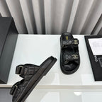 CHANEL dad sandals black lambskin mules