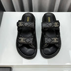 CHANEL dad sandals black lambskin mules