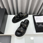 CHANEL dad sandals black patent interwoven leather