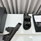 CHANEL dad sandals black patent interwoven leather
