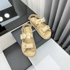 CHANEL dad sandals beige bow tie lambskin
