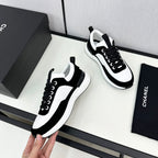 CHANEL SNEAKER IN BLACK SUEDE AND WHITE CALFSKIN