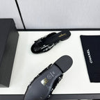CHANEL BOW MULE IN BLACK MIX WHITE FUR AND CALFSKIN